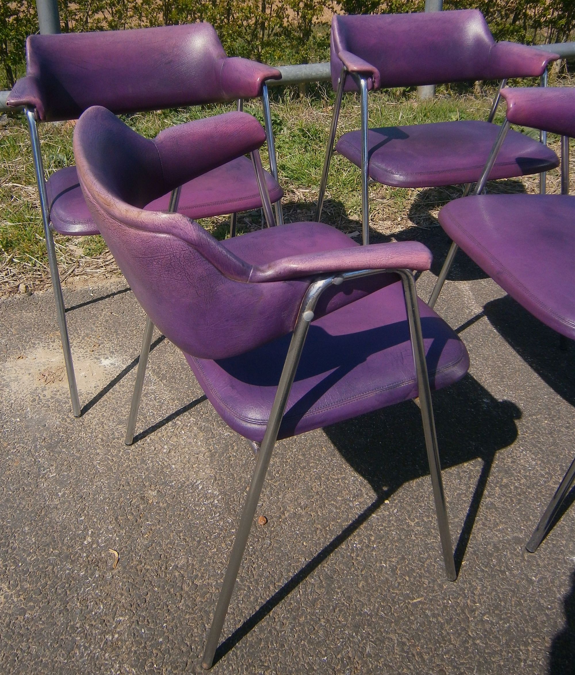 A set of four 1960s chrome framed Pel style elbow chairs